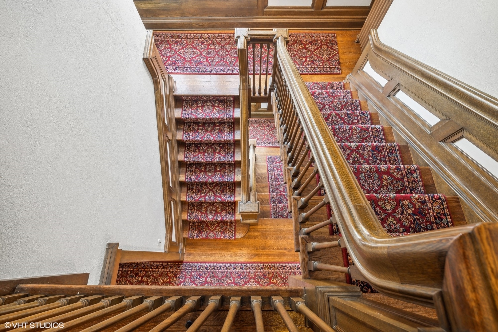 111 North Mayflower Road Lake Forest, IL 60045 - Photo 14 of 28 a view of staircase with wooden floor