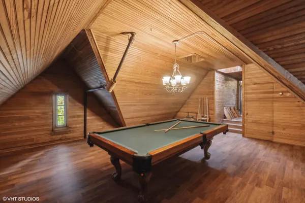 a view of outdoor space with wooden floor and stairs