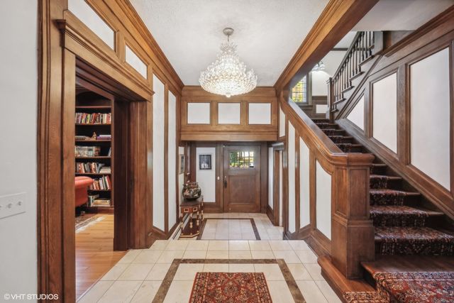 a view of an entryway with a front door