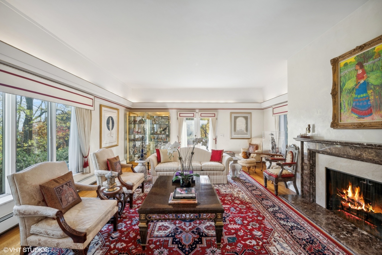111 North Mayflower Road Lake Forest, IL 60045 - Photo 10 of 28 a living room with furniture fireplace and a large window