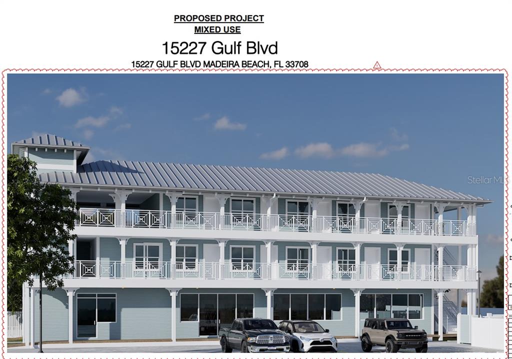 15227 Gulf Boulevard Madeira Beach, FL 33708 - Photo 1 of 2 a front view of a building with glass windows and brick wall