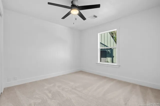 a bathroom with a double vanity sink a mirror and a bathtub