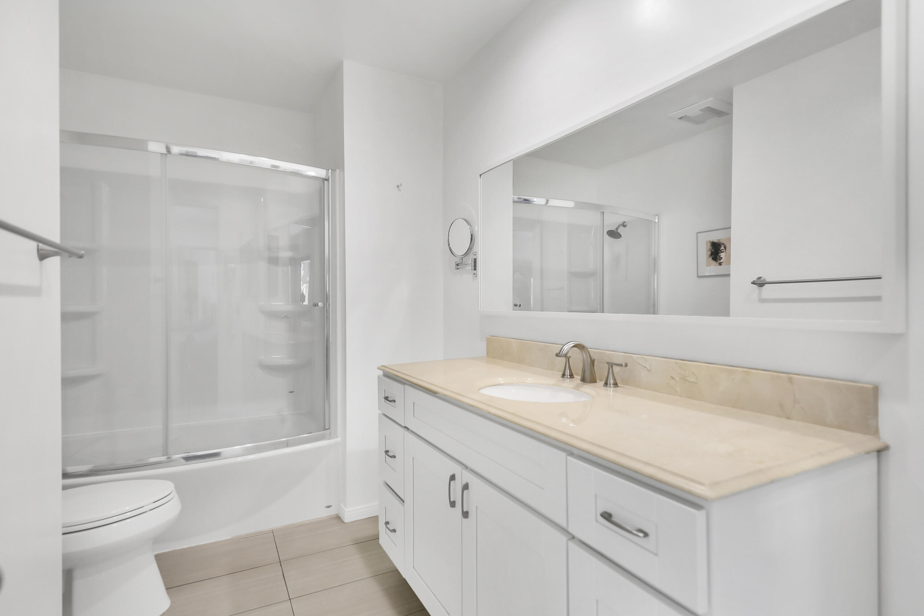 23 Haig Drive Rancho Mirage, CA 92270 - Photo 12 of 49 a bathroom with a granite countertop sink toilet and shower