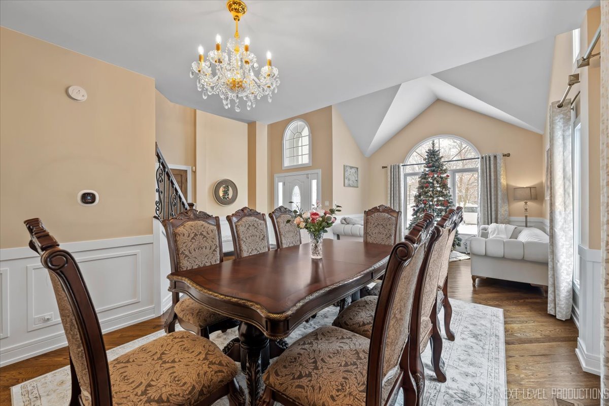 970 Waterside Court Aurora, IL 60502 - Photo 10 of 42 a view of a dining room with furniture and a chandelier