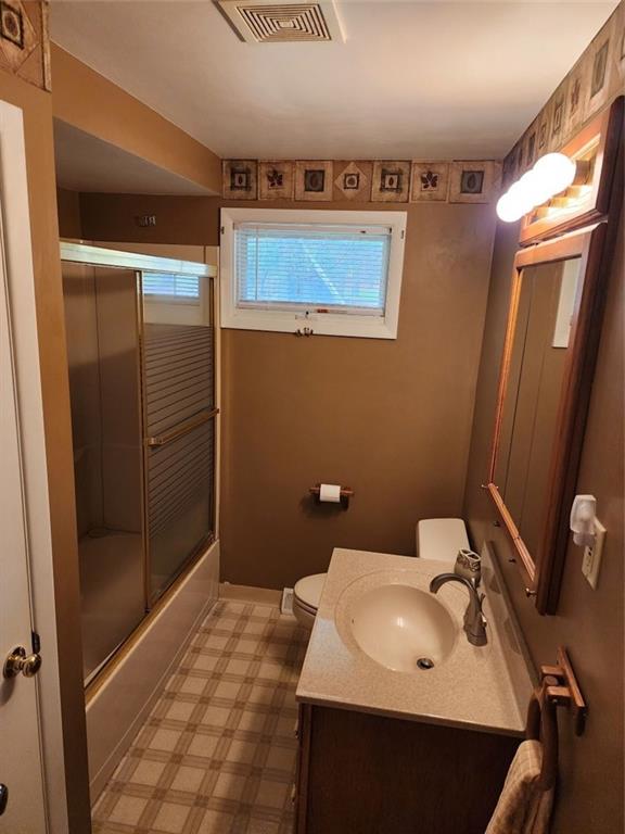 427 Lutz School Road Indiana, PA 15701 - Photo 11 of 15 a bathroom with a sink a toilet a mirror and shower