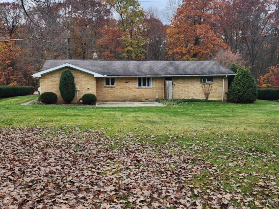 427 Lutz School Road Indiana, PA 15701 - Photo 2 of 15 a house that has a tree in front of it
