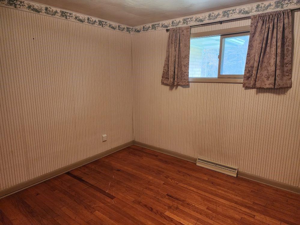 427 Lutz School Road Indiana, PA 15701 - Photo 10 of 15 a view of a small space with wooden floor and a window