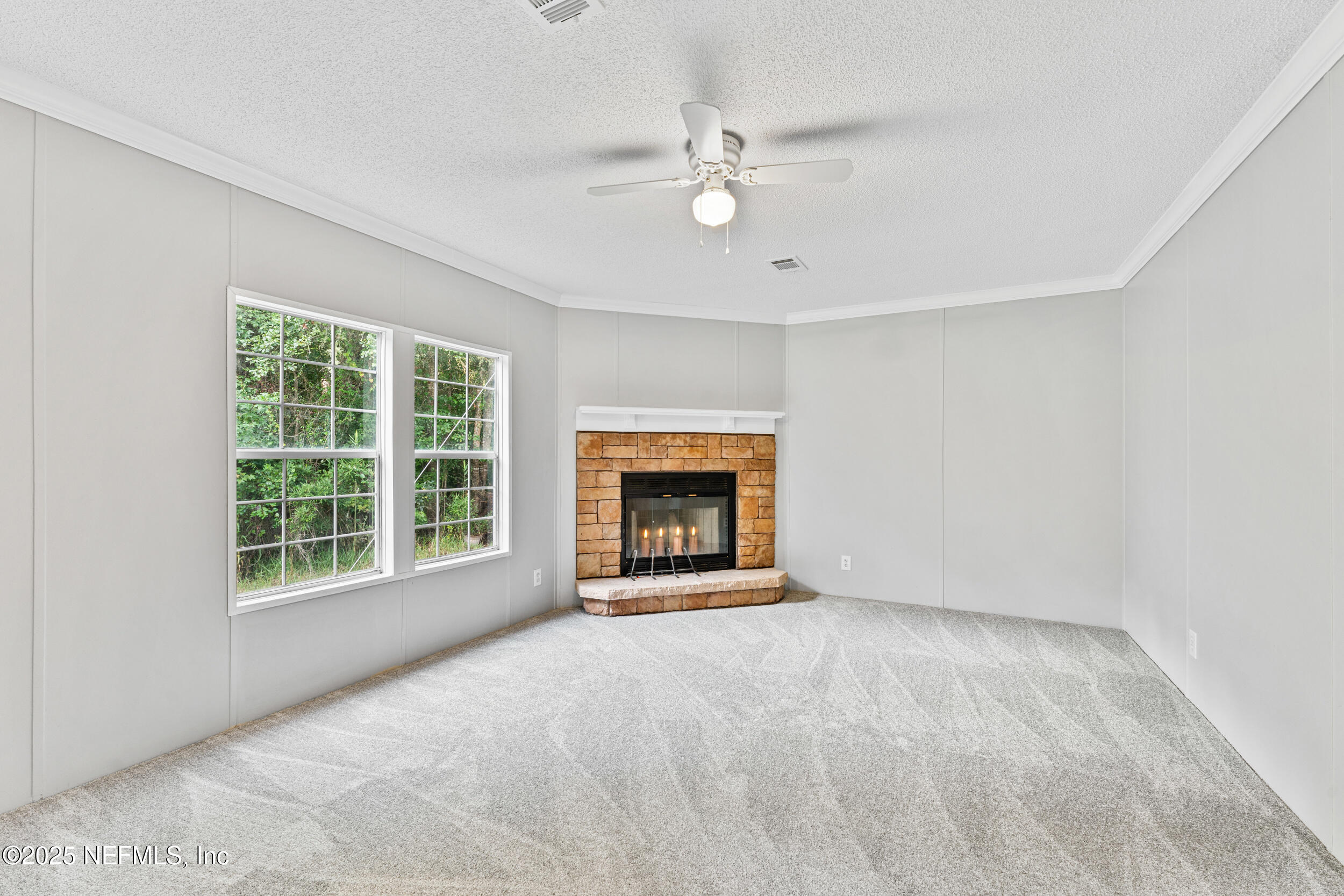 37341 Old Pineridge Road Hilliard, FL 32046 - Photo 12 of 27 a view of an empty room with a window