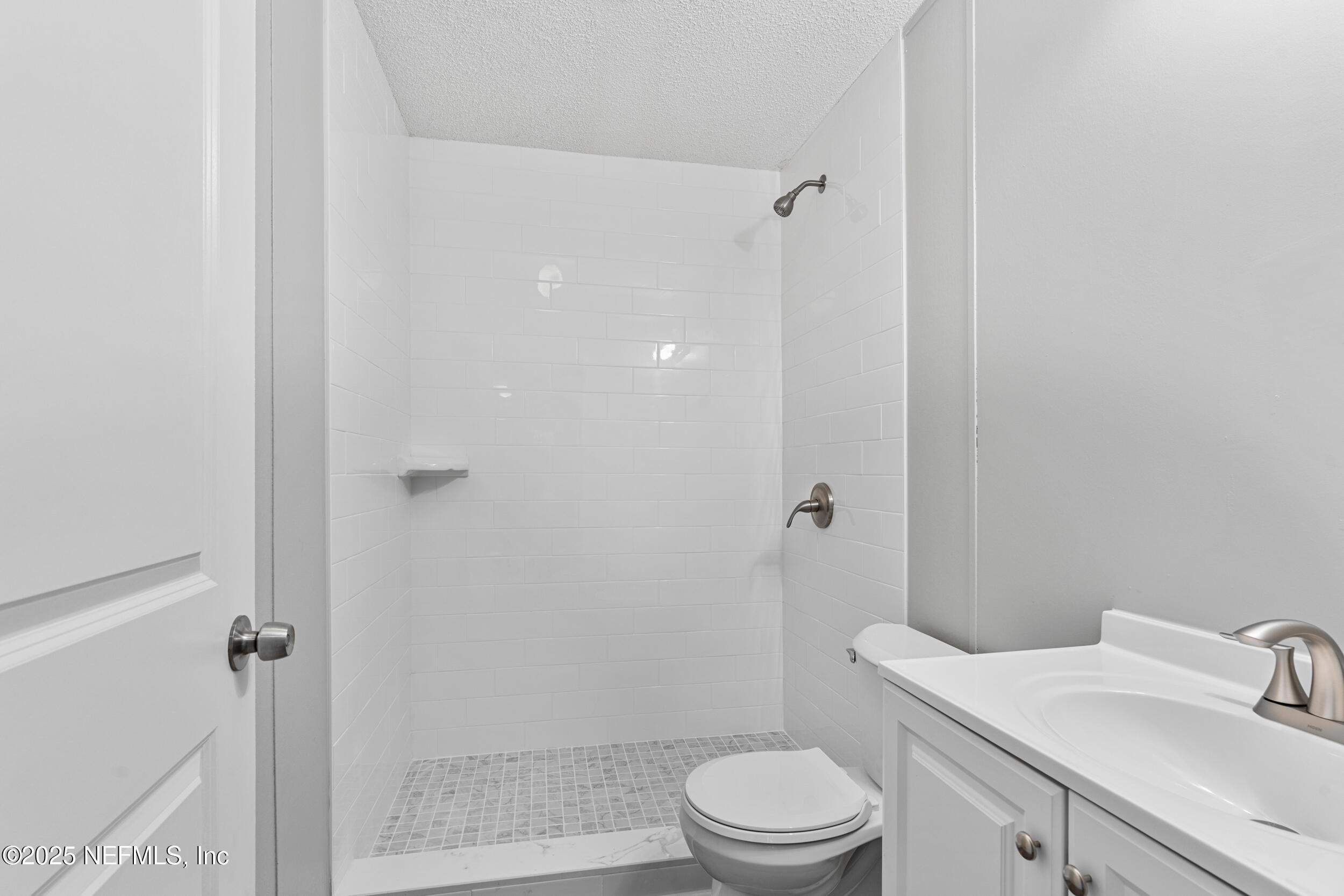 37341 Old Pineridge Road Hilliard, FL 32046 - Photo 17 of 27 a bathroom with a sink a toilet and shower