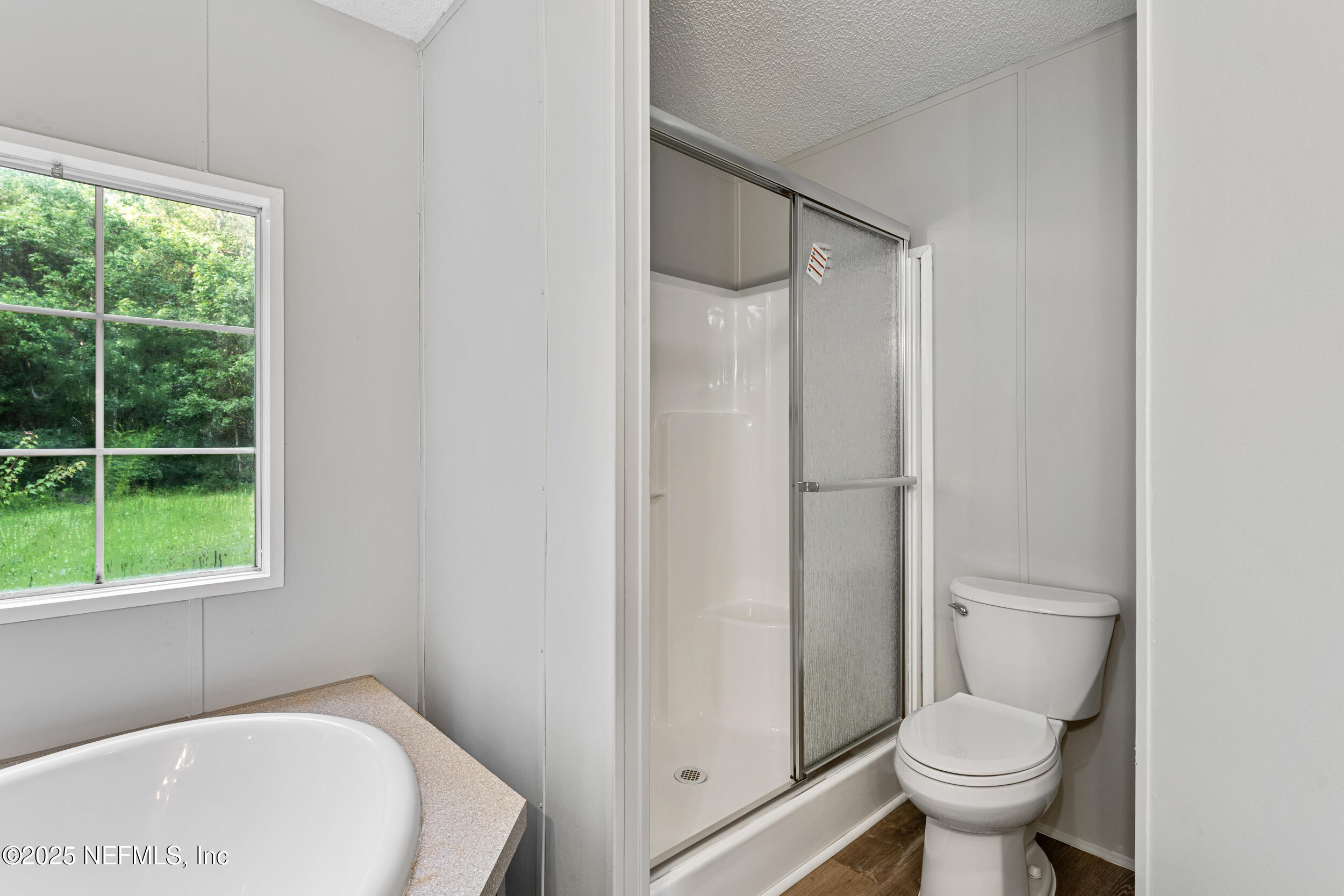 37341 Old Pineridge Road Hilliard, FL 32046 - Photo 20 of 27 a bathroom with a toilet and a shower