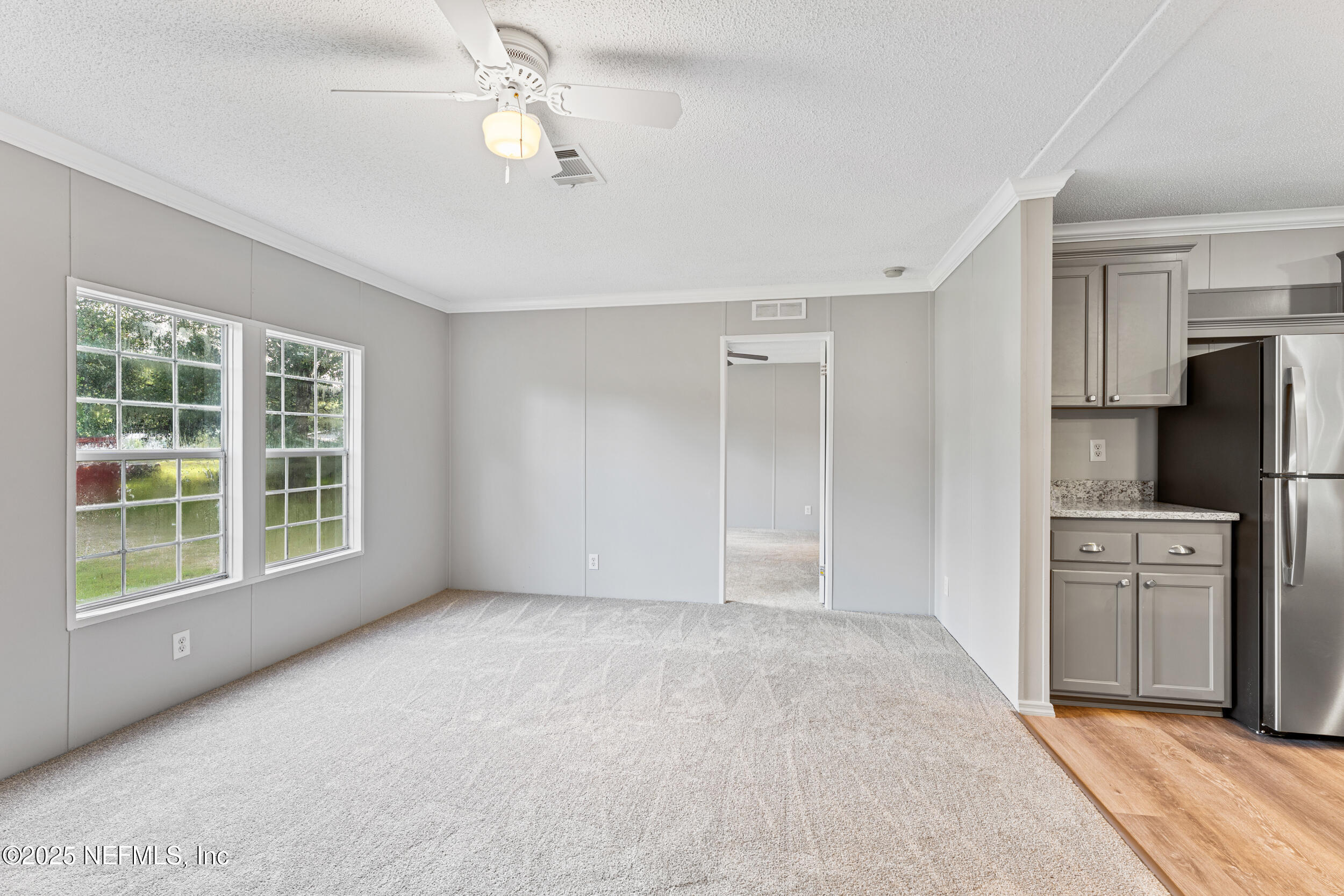 37341 Old Pineridge Road Hilliard, FL 32046 - Photo 5 of 27 a view of an empty room with a window