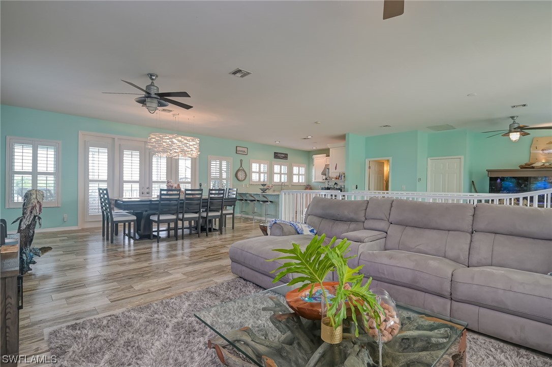 12614 River Road Fort Myers, FL 33905 - Photo 11 of 50 a living room with furniture and wooden floor