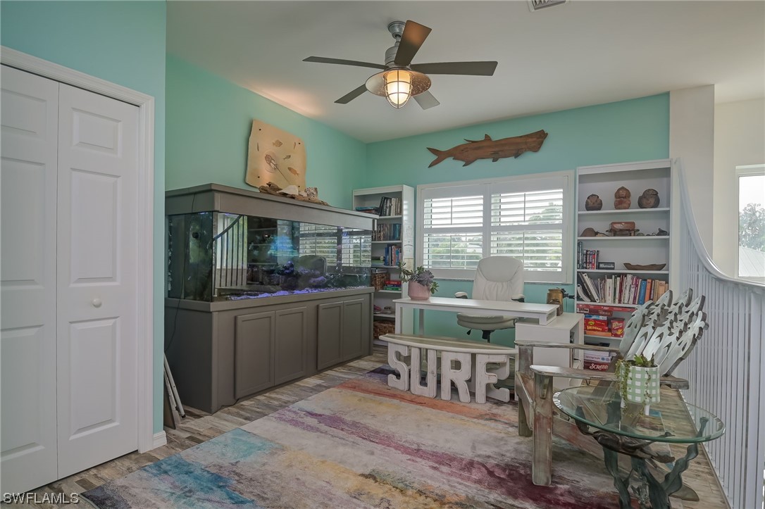 12614 River Road Fort Myers, FL 33905 - Photo 14 of 50 a dining room with furniture window and wooden floor