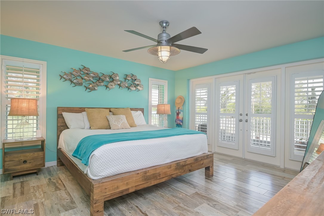 12614 River Road Fort Myers, FL 33905 - Photo 20 of 50 a bedroom with a large bed and a window