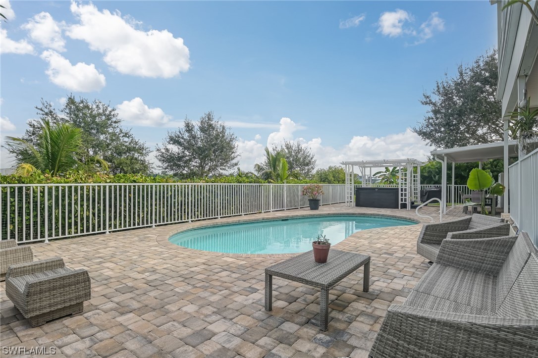 12614 River Road Fort Myers, FL 33905 - Photo 29 of 50 a view of a chair and tables in the patio