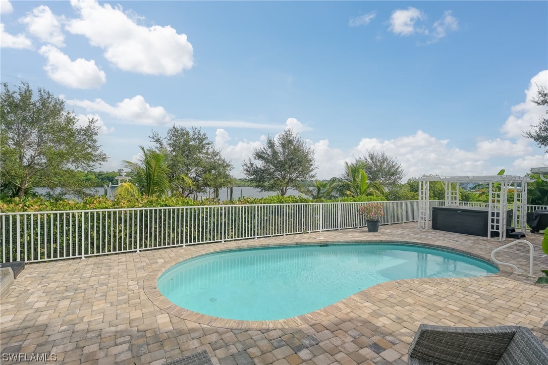 12614 River Road Fort Myers, FL 33905 - Photo 30 of 50 a view of a swimming pool and deck