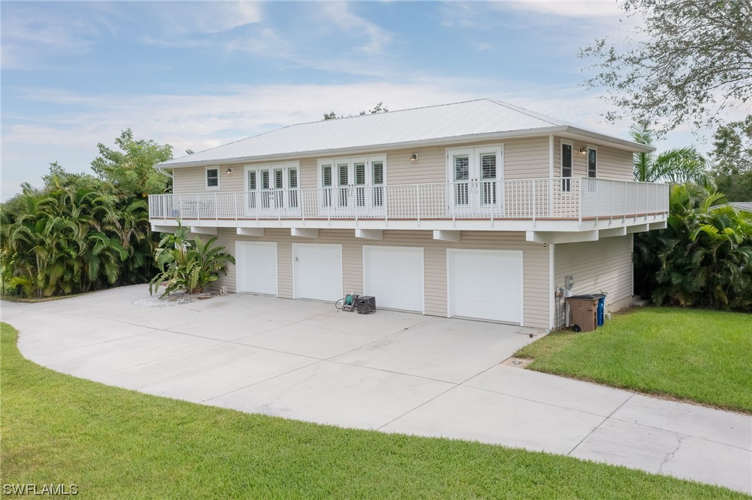 12614 River Road Fort Myers, FL 33905 - Photo 42 of 50 a front view of house with yard