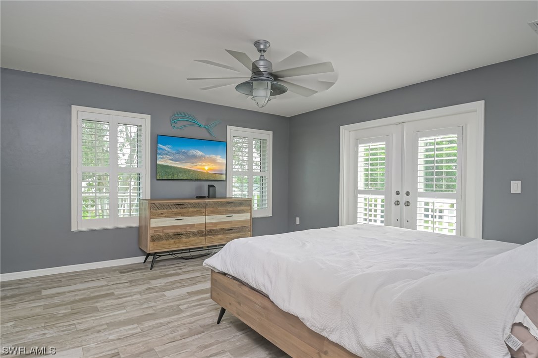 12614 River Road Fort Myers, FL 33905 - Photo 47 of 50 a bedroom with a large bed and a window