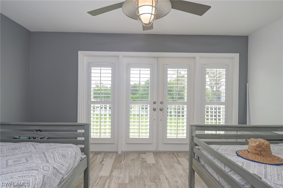 12614 River Road Fort Myers, FL 33905 - Photo 49 of 50 a spacious bedroom with a bed and a large window