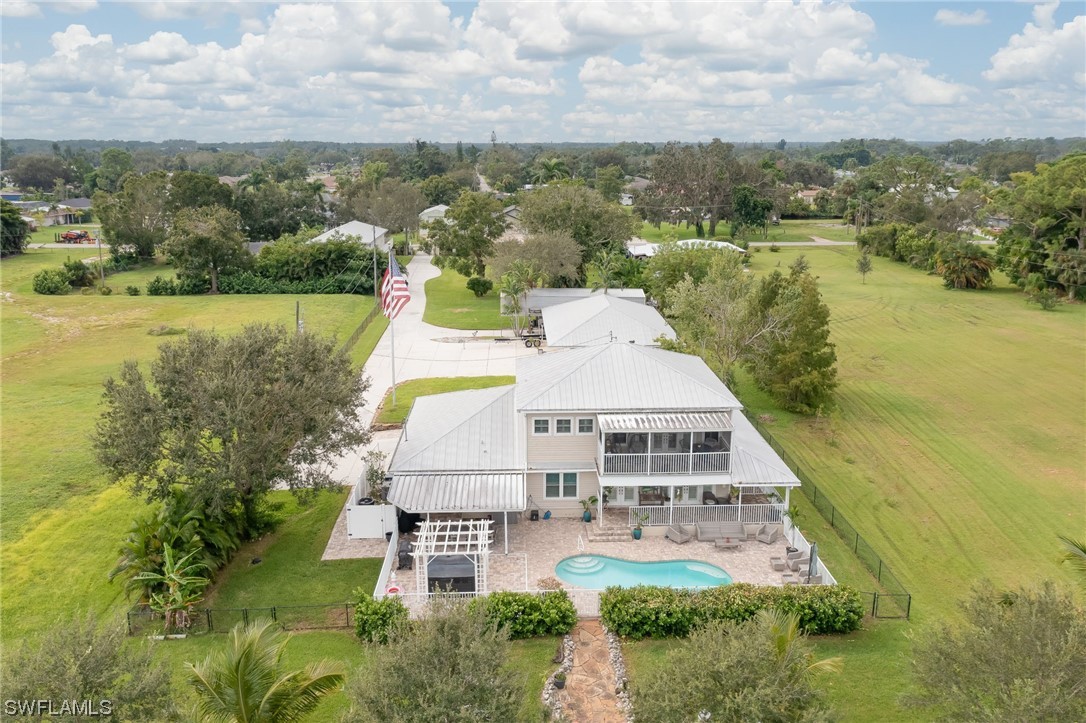 12614 River Road Fort Myers, FL 33905 - Photo 5 of 50 an aerial view of a house with outdoor space lake view and lake view