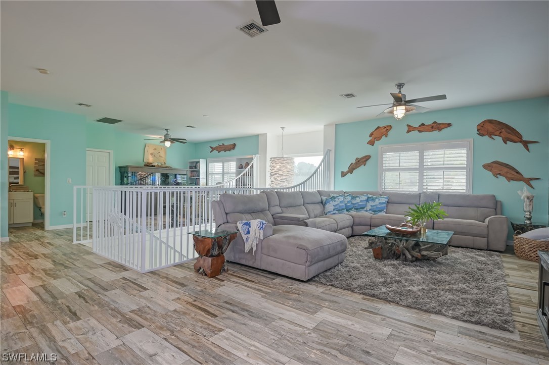 12614 River Road Fort Myers, FL 33905 - Photo 10 of 50 a living room with furniture and a large window