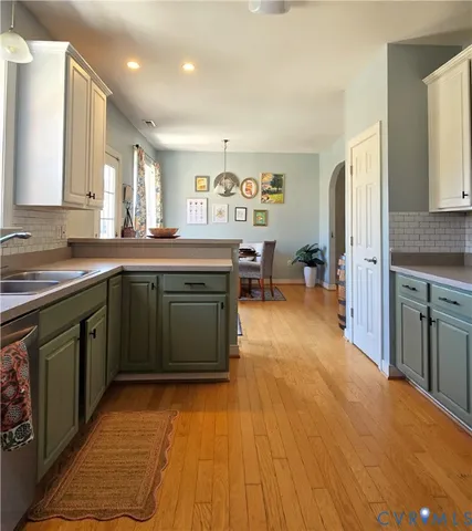 a view of a dining area with furniture window and wooden floor