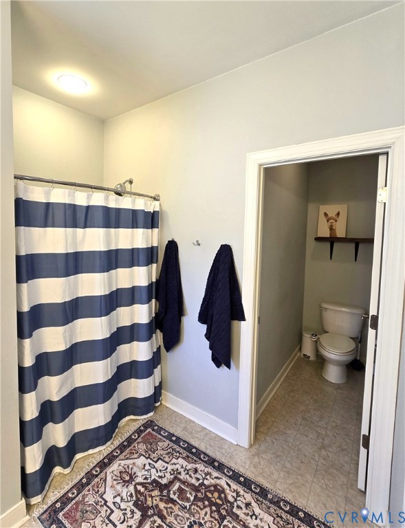 68 Fitzhugh Street White Stone, VA 22578 - Photo 21 of 26 a bathroom with a sink and mirror