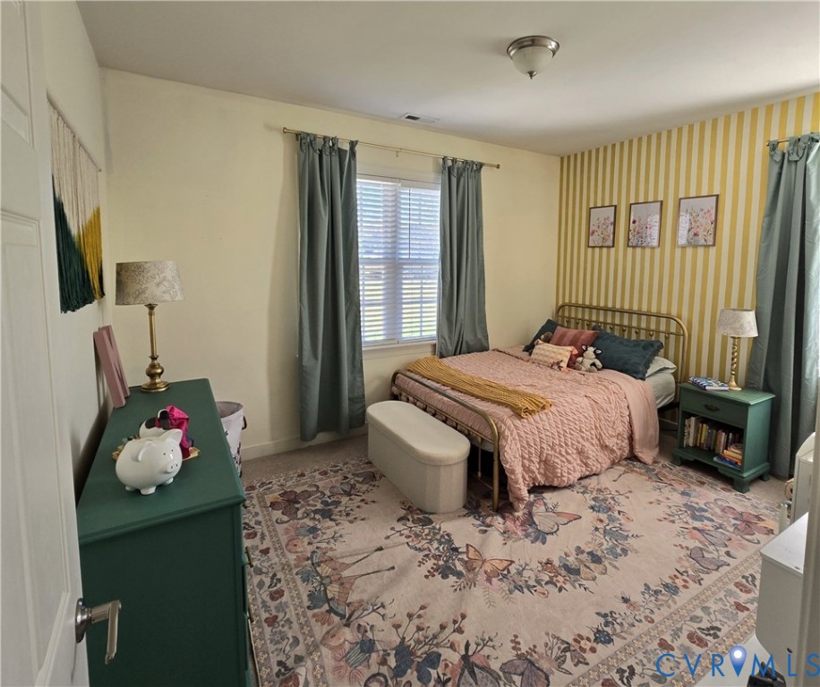 68 Fitzhugh Street White Stone, VA 22578 - Photo 22 of 26 a bedroom with a bed and a window