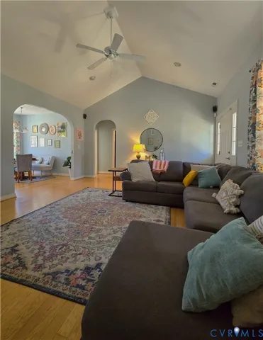 a kitchen with kitchen island granite countertop wooden cabinets and center island