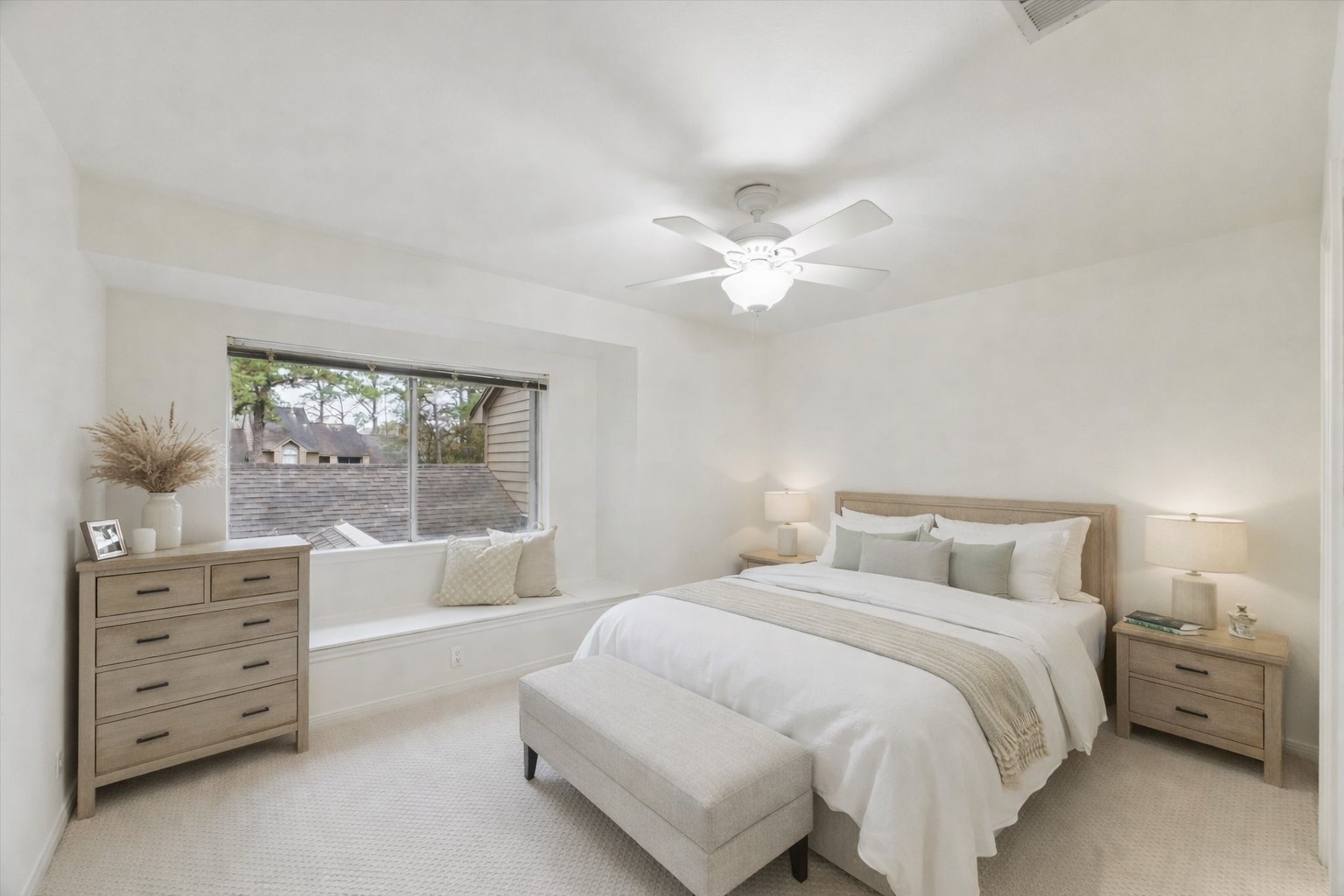 12 Lakeridge Drive Spring, TX 77381 - Photo 18 of 24 Large secondary bedroom with oversized windows, neutral tones, and ample closet space—perfect for guests or family. Virtually Staged