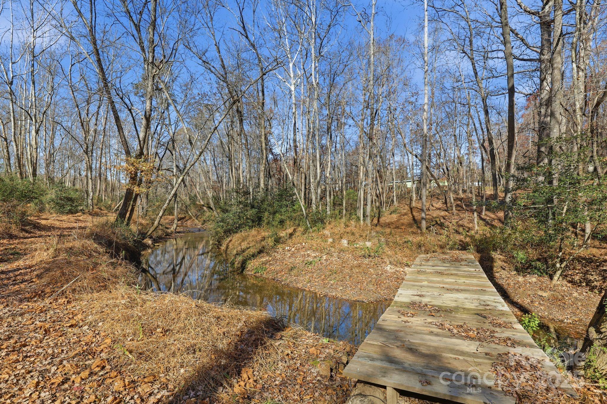 2201 Old Mountain Road Hiddenite, NC 28636 - Photo 11 of 16 a view of backyard with wooden fence