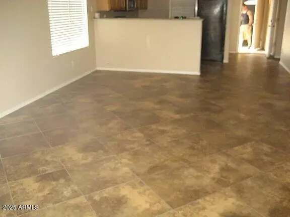 a view of a room with an empty space