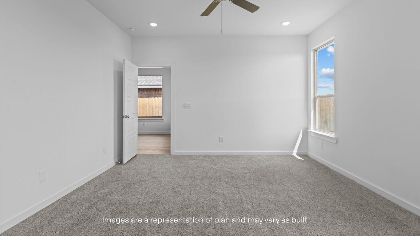 2232 150th Place Lubbock, TX 79423 - Photo 10 of 19 a view of an empty room with a window