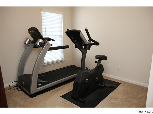 623 6th Baxter Crossing, Unit 623 Fort Mill, SC 29708 - Photo 14 of 15 a room with gym equipment