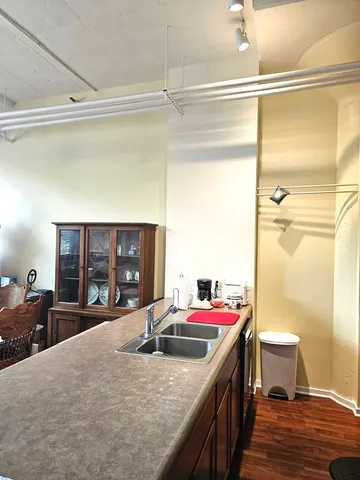 a bed room with a bed and a tv