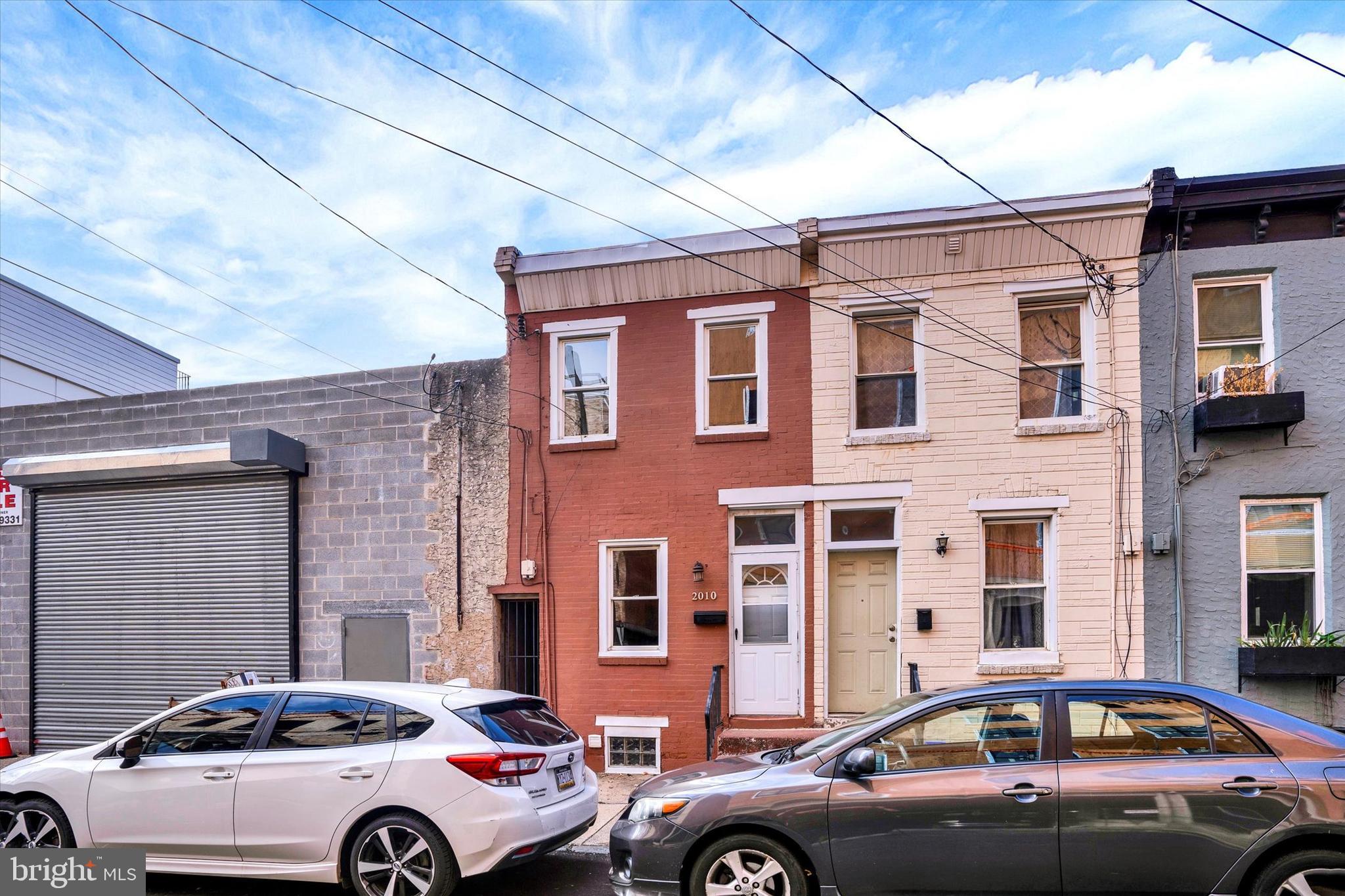 a car parked in front of a building