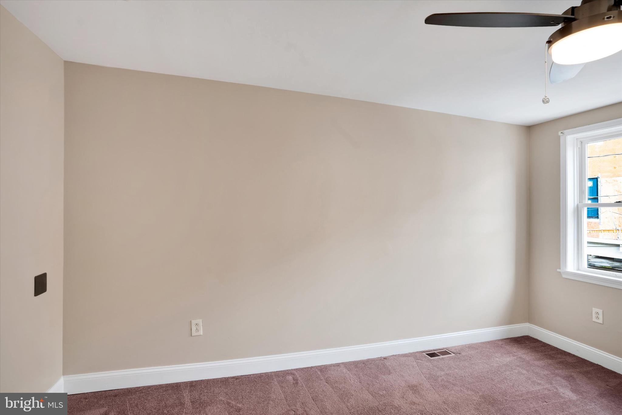 2010 East Boston Street Philadelphia, PA 19125 - Photo 21 of 25 an empty room with windows