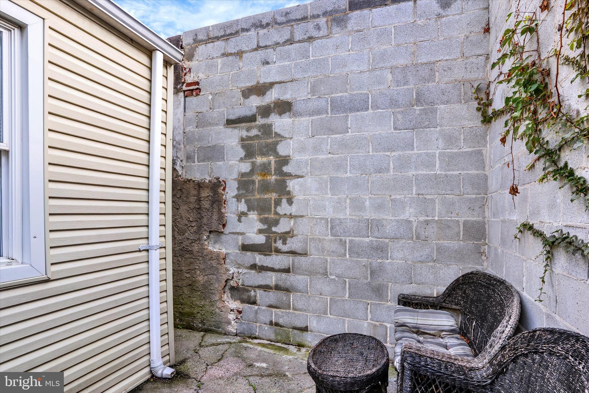2010 East Boston Street Philadelphia, PA 19125 - Photo 24 of 25 a bathroom with a granite countertop sink and a mirror