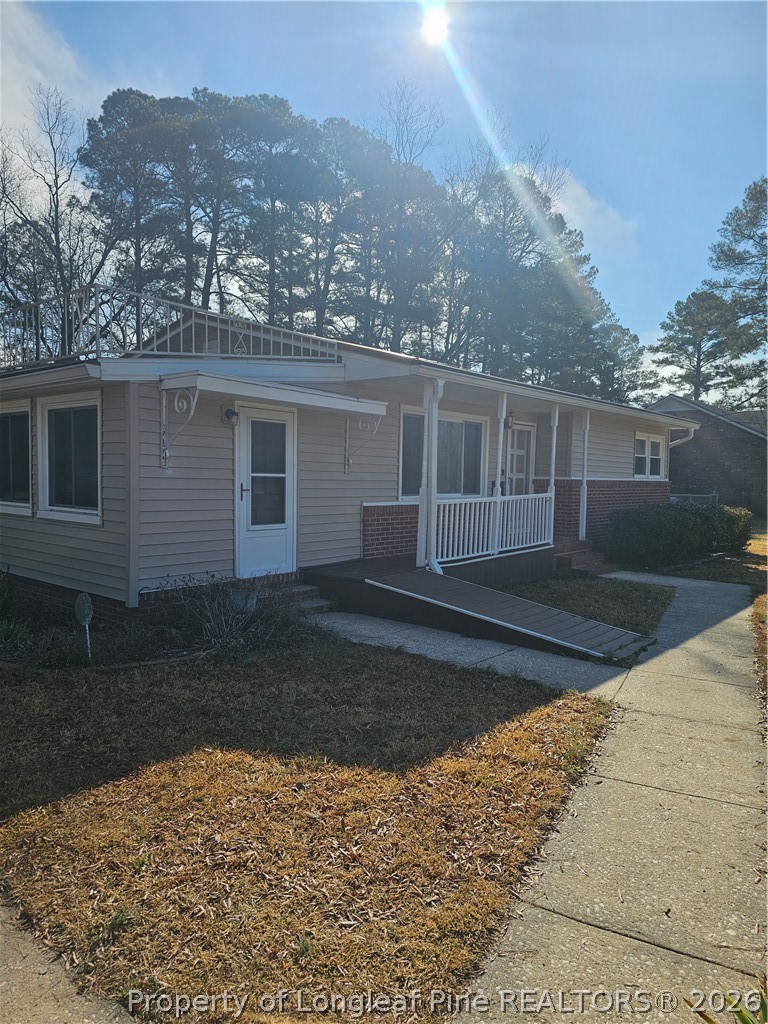 2133 Al Ray Road Fayetteville, NC 28312 - Photo 2 of 6 a front view of a house with a yard