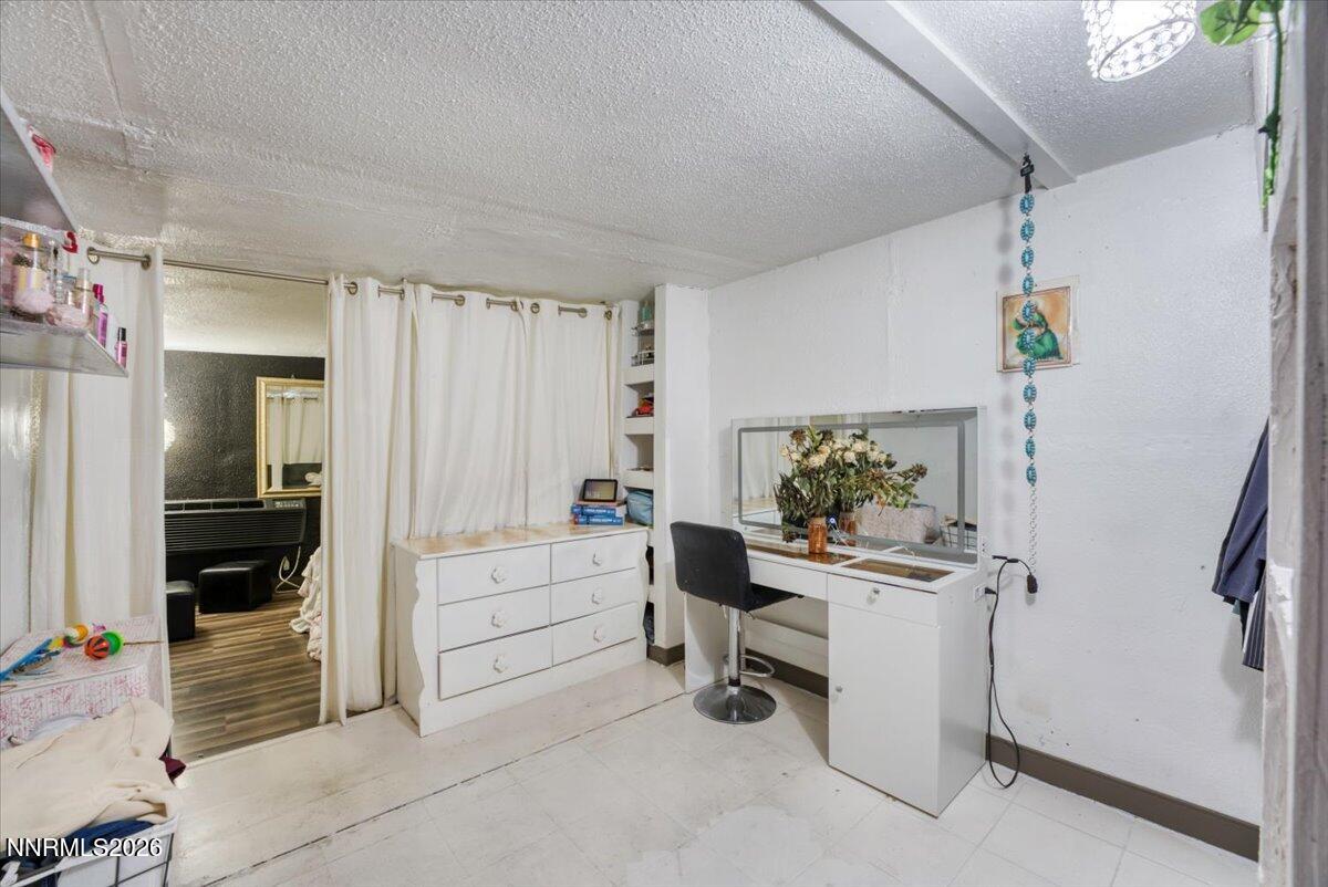 985 Villa Way Fernley, NV 89408 - Photo 14 of 37 a workspace with furniture and window