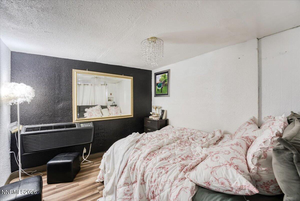 985 Villa Way Fernley, NV 89408 - Photo 15 of 37 a bedroom with a bed and a window