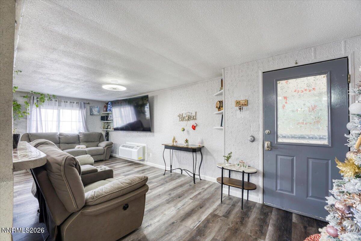 985 Villa Way Fernley, NV 89408 - Photo 2 of 37 a living room with furniture and a window