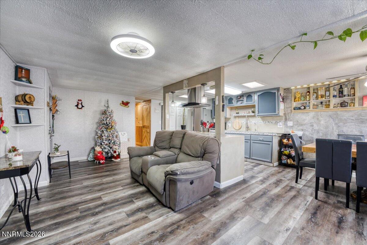 985 Villa Way Fernley, NV 89408 - Photo 4 of 37 a living room with furniture and kitchen view