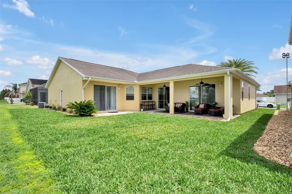 4946 Northeast 124th Road Oxford, FL 34484 - Photo 43 of 69 a view of an house with backyard and porch