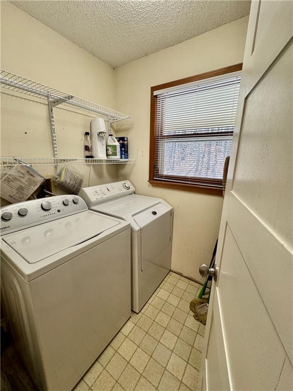 1012 King Mill Road McDonough, GA 30252 - Photo 15 of 64 a utility room with dryer and washer