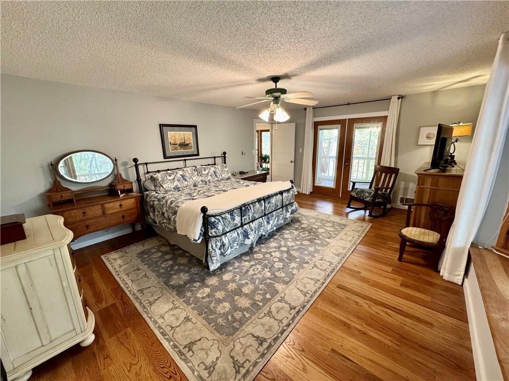 1012 King Mill Road McDonough, GA 30252 - Photo 20 of 64 a living room with a bed furniture and a dresser