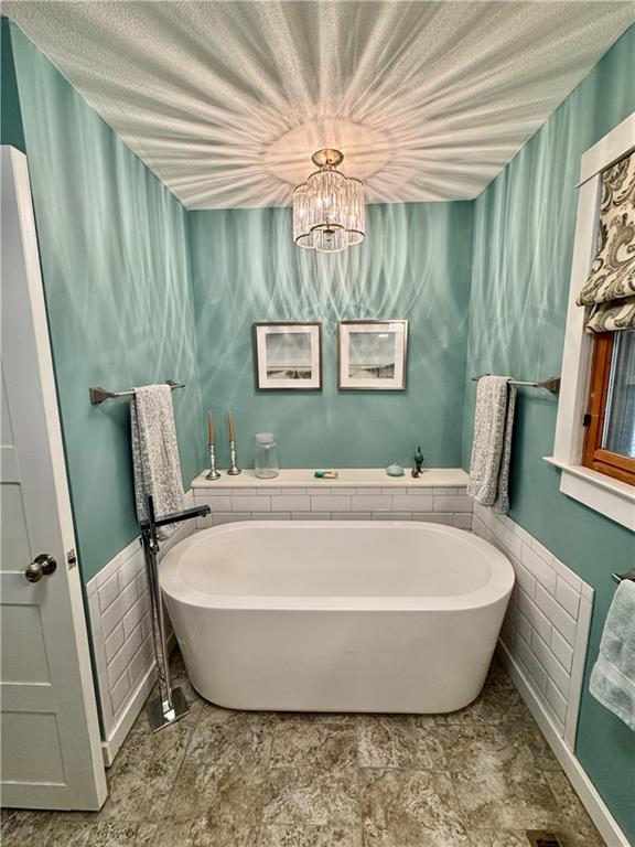 1012 King Mill Road McDonough, GA 30252 - Photo 22 of 64 a view of a bathtub in a room