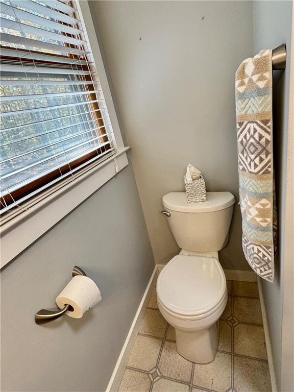 1012 King Mill Road McDonough, GA 30252 - Photo 31 of 64 a bathroom with a toilet sink and mirror