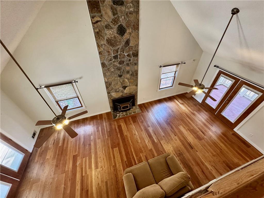 1012 King Mill Road McDonough, GA 30252 - Photo 34 of 64 a view of an empty room with wooden floor and stairs