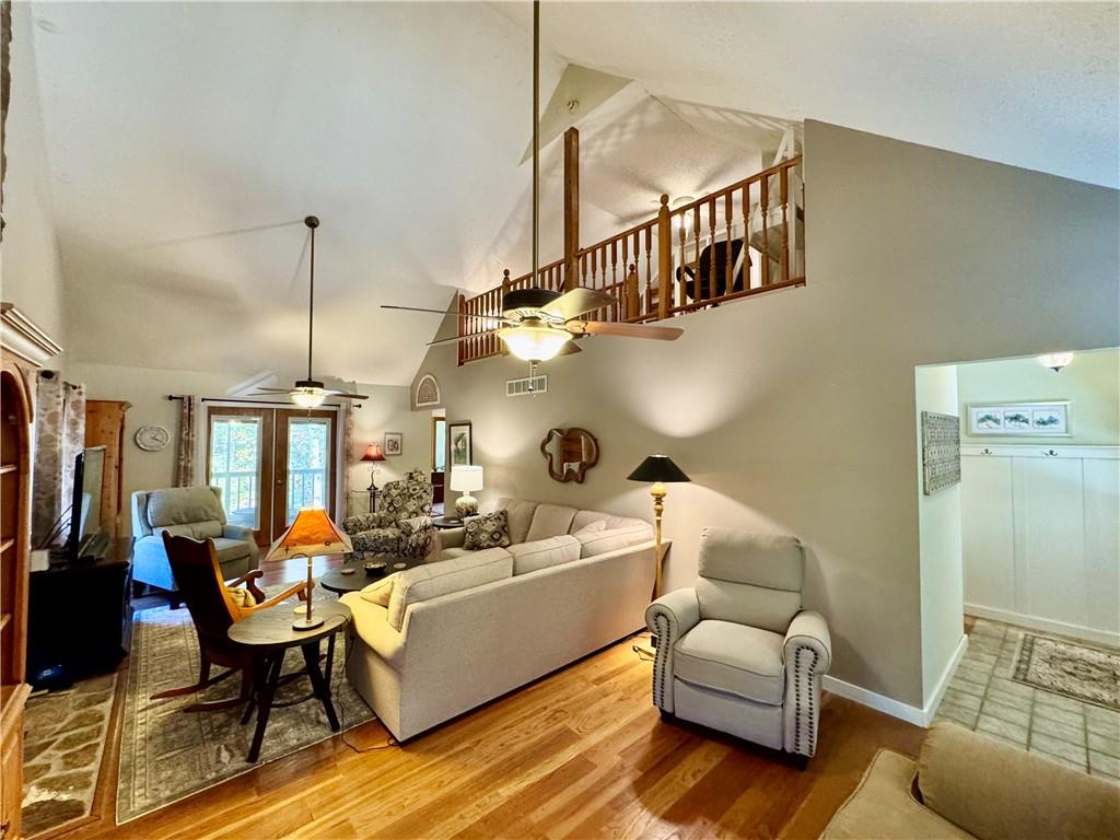 1012 King Mill Road McDonough, GA 30252 - Photo 5 of 64 a living room with furniture kitchen view and a chandelier